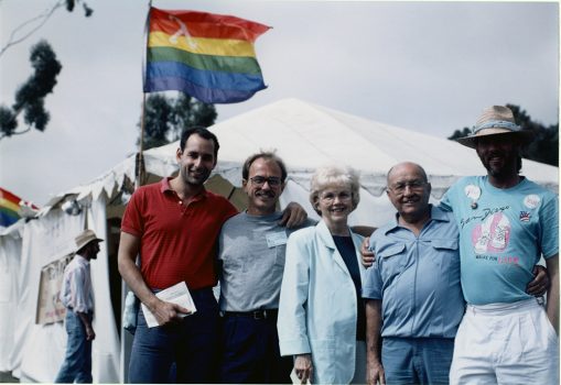 Jess Jessop (second to left) outside Lesbian and Gay Archives tent at Pride